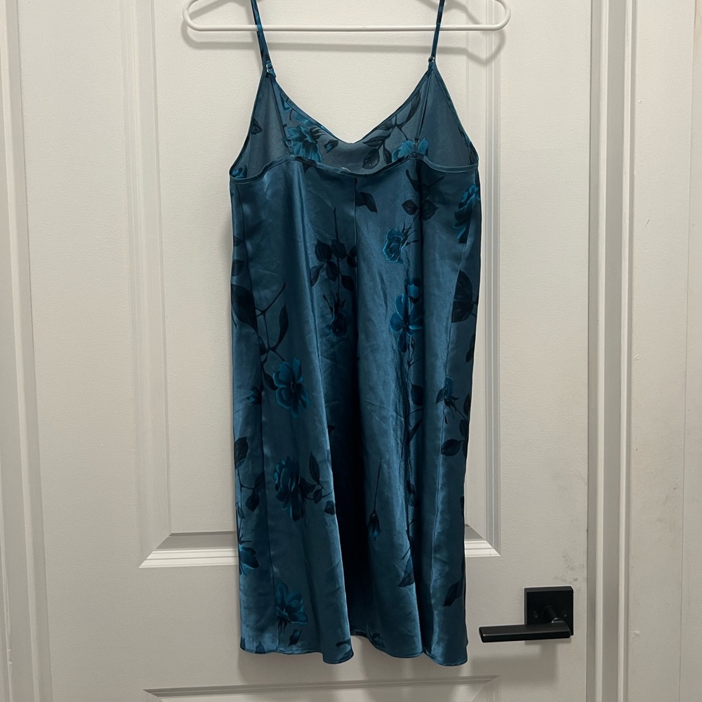 A large blue slip dress is perfect condition.